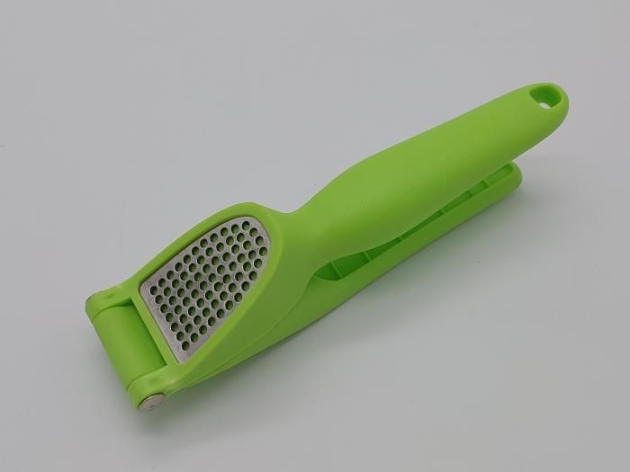 Чесночница для чеснока давилка пластиковая Чесночный пресс Измельчитель чеснока ручной кухонный Чеснокодавка 19435 фото