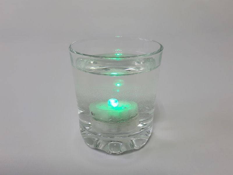Светодиодная свеча на батарейках искусственная Электронная LED свеча таблетка D 3 cm H 2 cm РАБОТАЕТ ОТ ВОДЫ 14672 фото